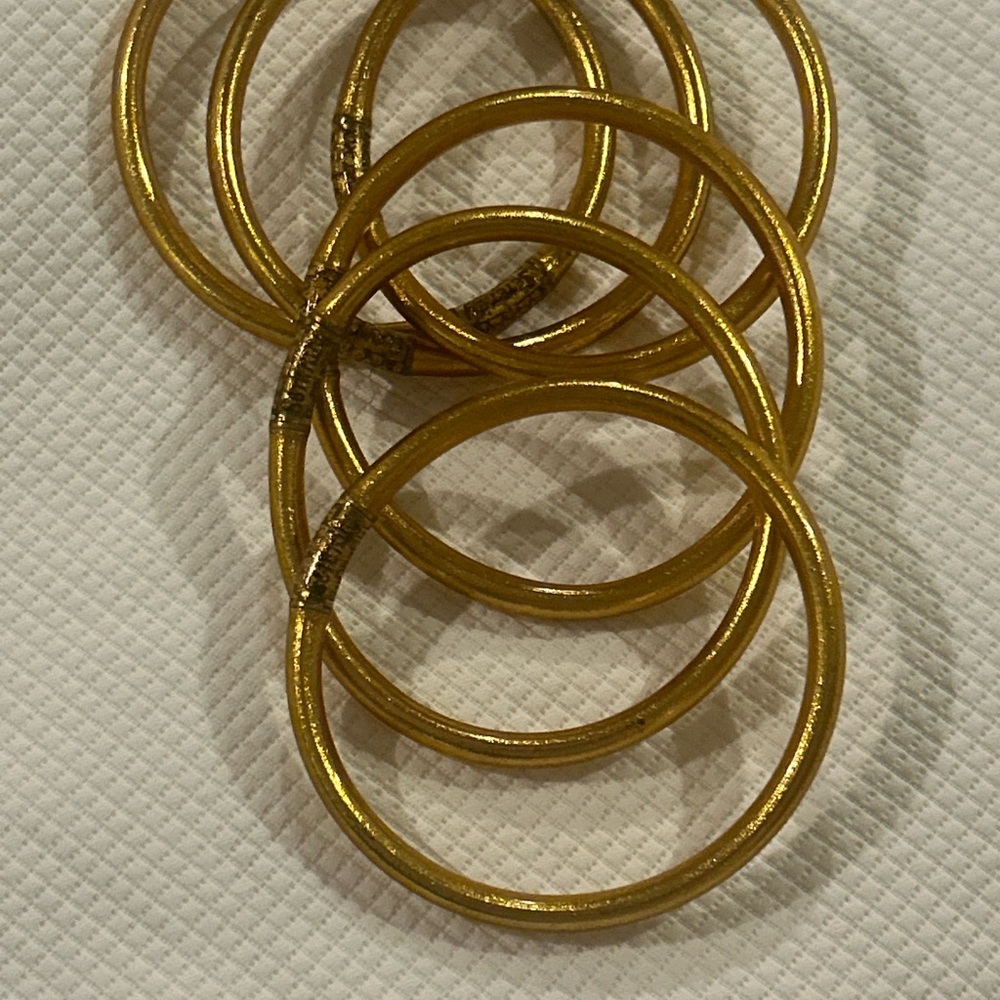 Gold BUHDAGIRL all weather bracelets, set of 6, size medium.